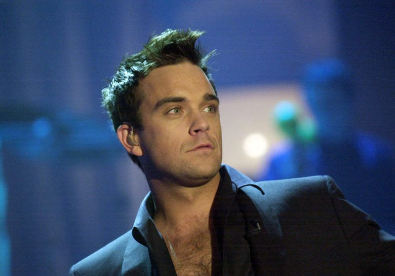Drama lui Robbie Williams. Isi injecteaza hormoni, pentru ca are “libidoul unui om de 100 de ani"