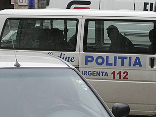Politist prins in flagrant pentru santaj