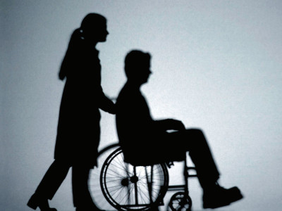 Lectie de vointa predata de un tanar imobilizat intr-un scaun cu rotile