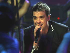 Robbie Wiliams lasa O.Z.N-urile pentru muzica