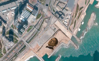 Gigantul Obama se afla pe o plaja din Barcelona