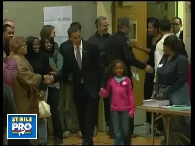 Barack si Michelle Obama au votat in Chicago