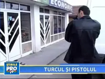 Trei focuri de arma au semanat panica intr-un complex comercial din Buzau