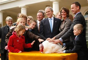 Cum isi petrec Ziua Recunostintei Bush si Obama?