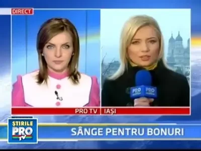 Stau la coada sa doneze sange, pentru bonurile de masa!