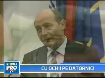 Basescu: Statul va obliga restantierii sa isi plateasca ratele la banci