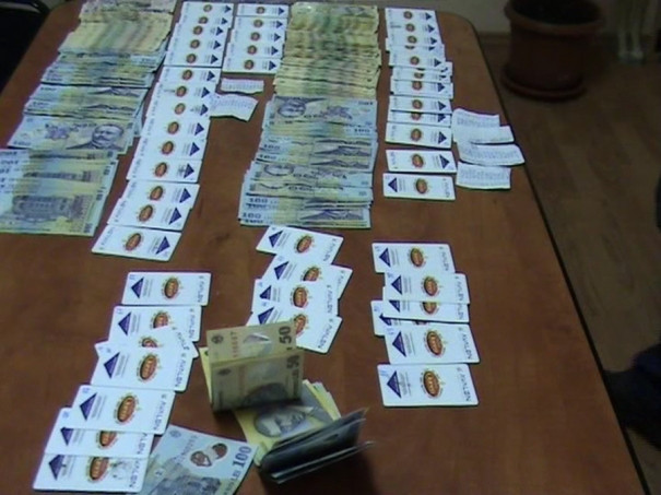 Agentii DIICOT au prins mai multi falsificatori de bani, chiar cand incercau sa scape de 100.000 lei