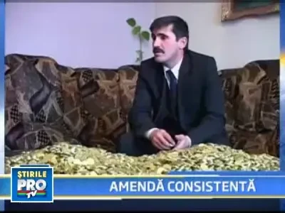 S-a razbunat! Amenda de 500 de lei platita in 50.000 de monede de un ban!