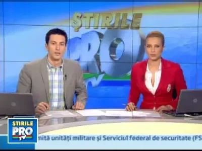 A scapat ca prin minune dupa ce a ramas blocata cu masina pe o cale ferata!