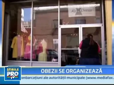 Acceptati-ne, suntem la fel ca voi! Asta striga obezii americani