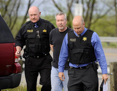 Caz Cioaca si in SUA! Un politist este suspectat ca si-a ucis doua sotii!