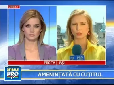 Tanara obligata cu un cutit sa renunte la 21.000 de euro