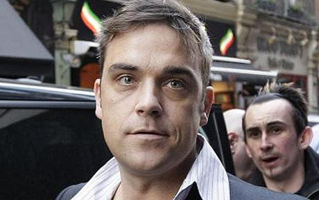 Frica de droguri si tracul nu-l lasa pe Robbie Williams sa plece in turneu