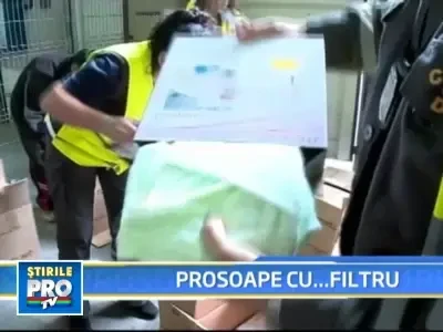 Ziceau ca transporta prosoape, dar ascundeau 600.000 de pachete de tigari