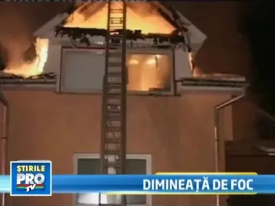 Au fost treziti de flacarile ce le cuprinsesera casai