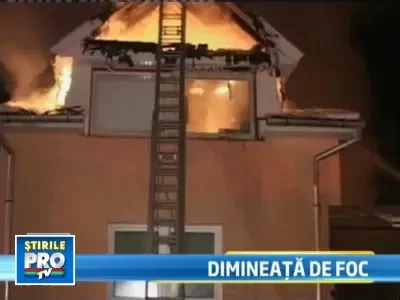 Au fost treziti de flacarile ce le cuprinsesera casa