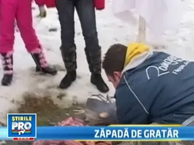 Romanii au incins gratarele la zero grade Celsius