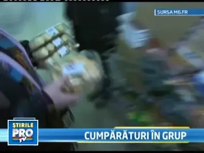 Pe vremuri de criza se poarta cumparaturile... in grup!