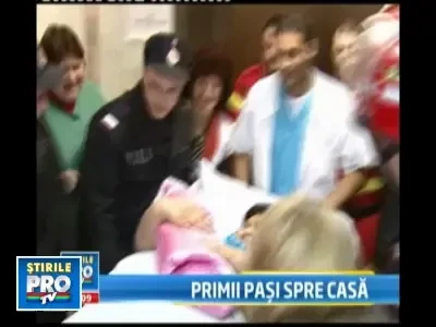 Mama de 240 de kg a fost externata, sustinuta de pompieri si medici