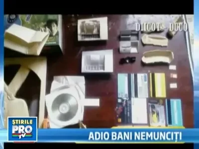 Retea de falsificatori de carduri, retinuta de DIICOT