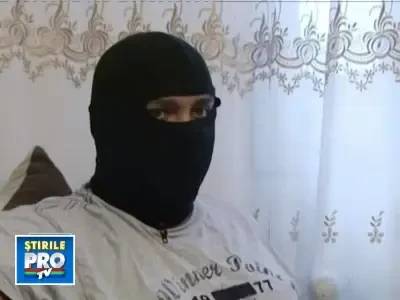 Politist luat pe capota masinii de talharul pe care-l urmarea!