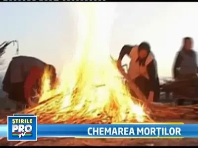 Au aprins focul pe morminte! Ca sa incalzeasca sufletele mortilor