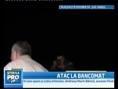 Au lovit si apoi au legat un paznic ca sa jefuiasca un bancomat