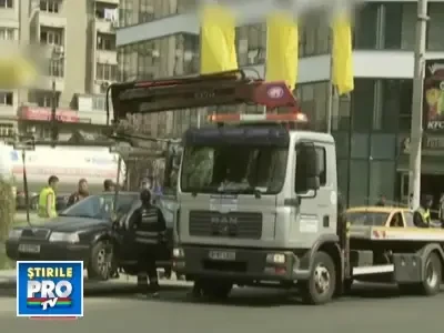 Ridicarea masinilor din centrul Bucurestiului se face ... ilegal