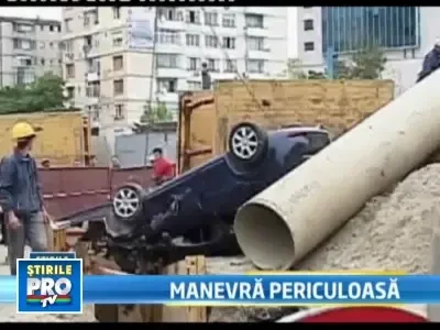 N-a vazut o groapa si a ajuns cu rotile in sus pe o movila de pamant!