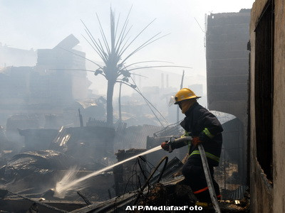 Dezastru in Filipine! Sute de case, inghitite de flacari