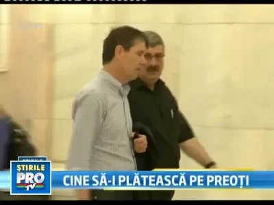 Prigoana vrea sa-i lase pe preoti fara salariu: Se pot intretine singuri!