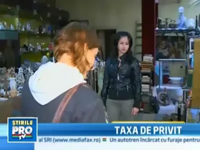 Taxa de privit, solutia unui magazin de anticariat de a scapa de curiosi