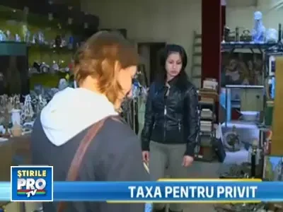 Taxa de privit, solutia unui magazin de anticariat de a scapa de curiosi