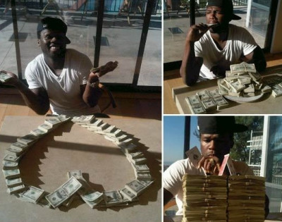 Te intrebai cum arata jumatate de milion de dolari? Iti arata 50 Cent