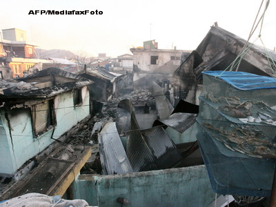 Case distruse, obuze si frica: prima zi de razboi coreean, in fotografii!