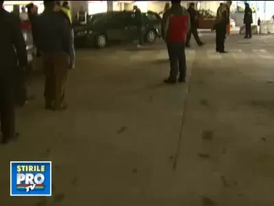 Bataie cu pumni si picioare in parcarea aeroportului Otopeni
