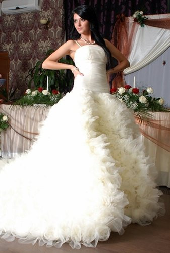 Kate Middleton ar putea imbraca o rochie de mireasa creata de un roman