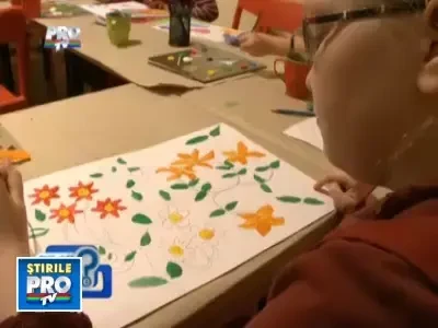 Nu uitati copiii in fata televizorului. Invatati-i sa se joace