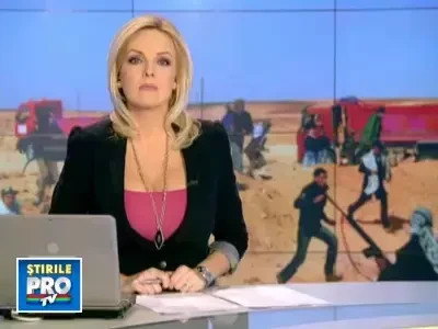 O romanca isi plange sotul ucis in Libia. Barbatul era jurnalist sportiv