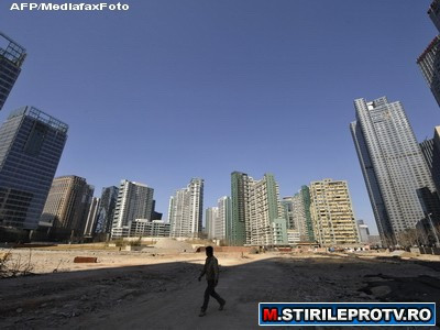 Chinezii isi reduc ritmul "stelar" de crestere din cauza problemelor mondiale