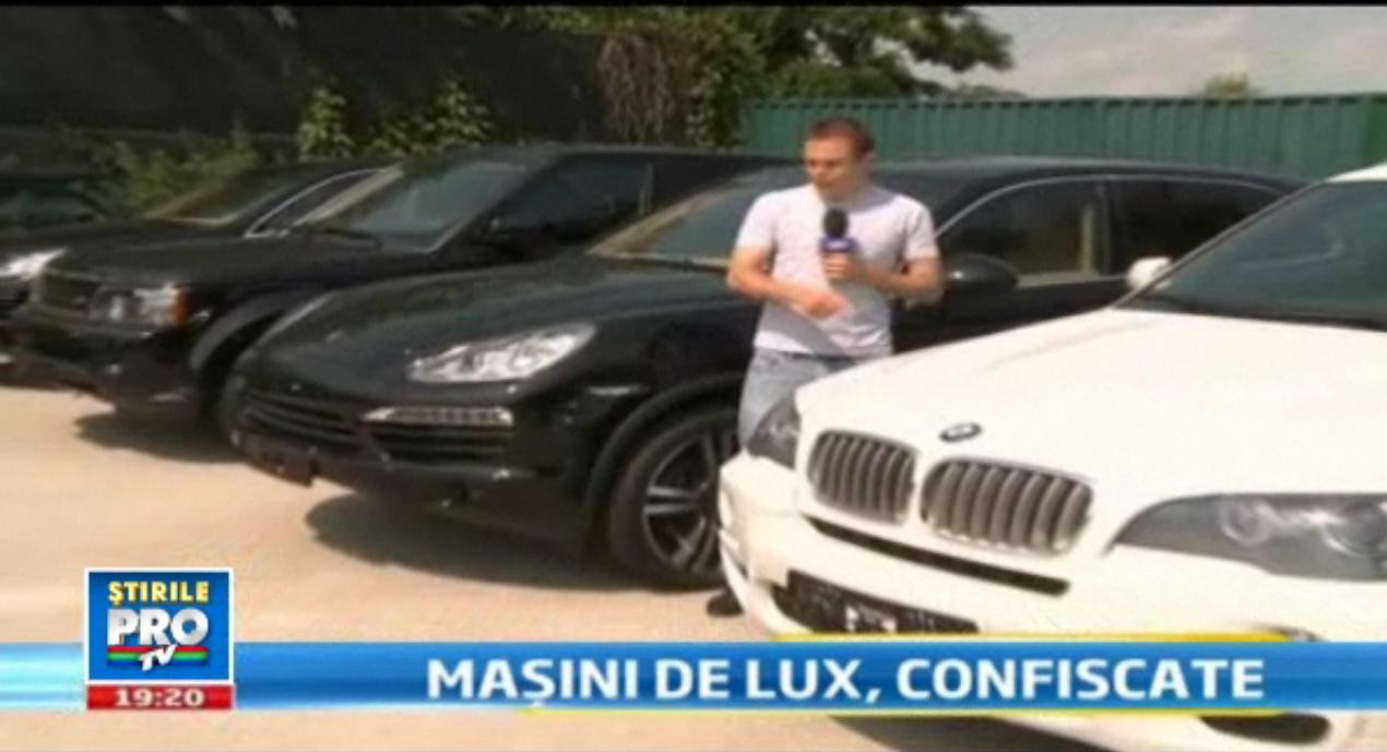 Au venit cu o Dacie Logan si au plecat cu BMW, Porsche si Range Rover. Lovitura Garzii Financiare
