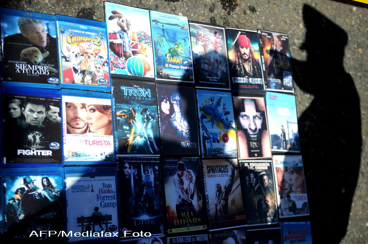 Reuters: Marea Britanie va legaliza copierea de CD-uri si DVD-uri