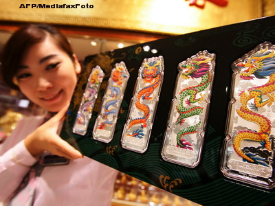 FMI: China poate amortiza impactul unei eventuale crize globale, declansate de Europa si SUA