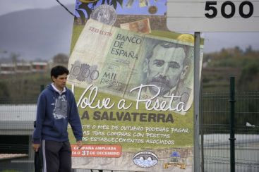 Saraciti de euro, spaniolii scotocesc dupa vechile pesetas. In Spania se cumpara in fosta moneda