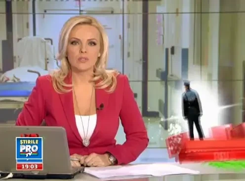 Un politist a impuscat un tanar pe strada, apoi s-a sinucis cu arma din dotare