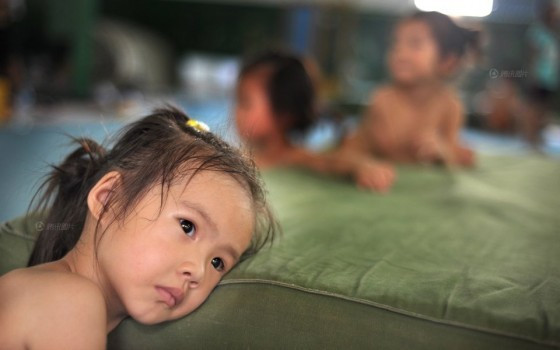 Antrenamente in lacrimi si durere. Prin ce chinuri trec micile gimnaste din China pentru un vis FOTO