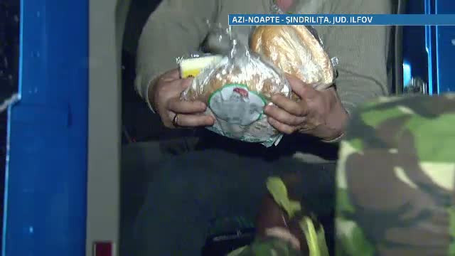 Alex Dima si George Vintila au impartit alimente oamenilor blocati de 40 de ore in nameti