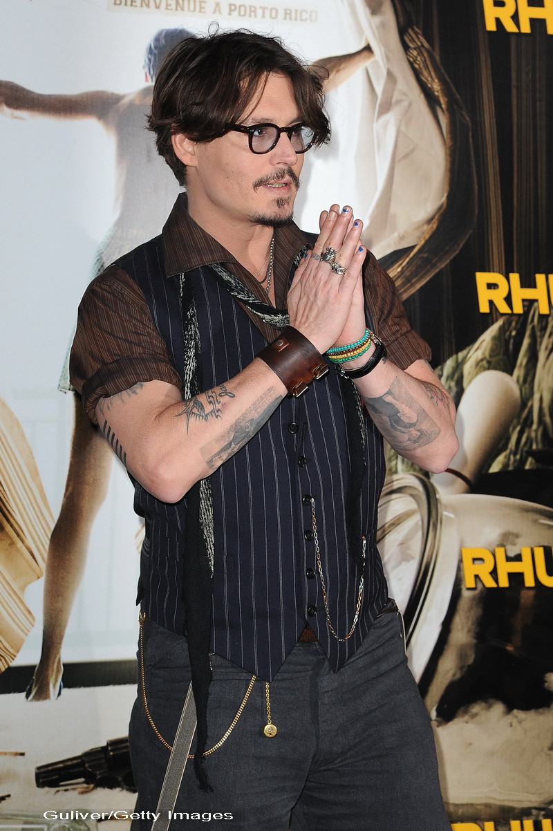 Johnny Depp se gandeste sa renunte la actorie dupa esecul filmului "Calaretul singuratic"