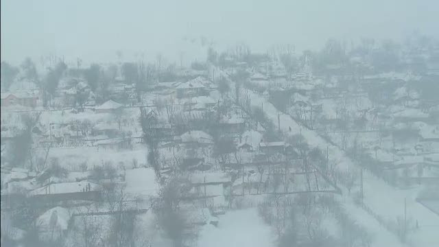 In satele izolate de restul lumii, alimentele au ajuns doar cu elicopterul. Zapada are 5 m inaltime