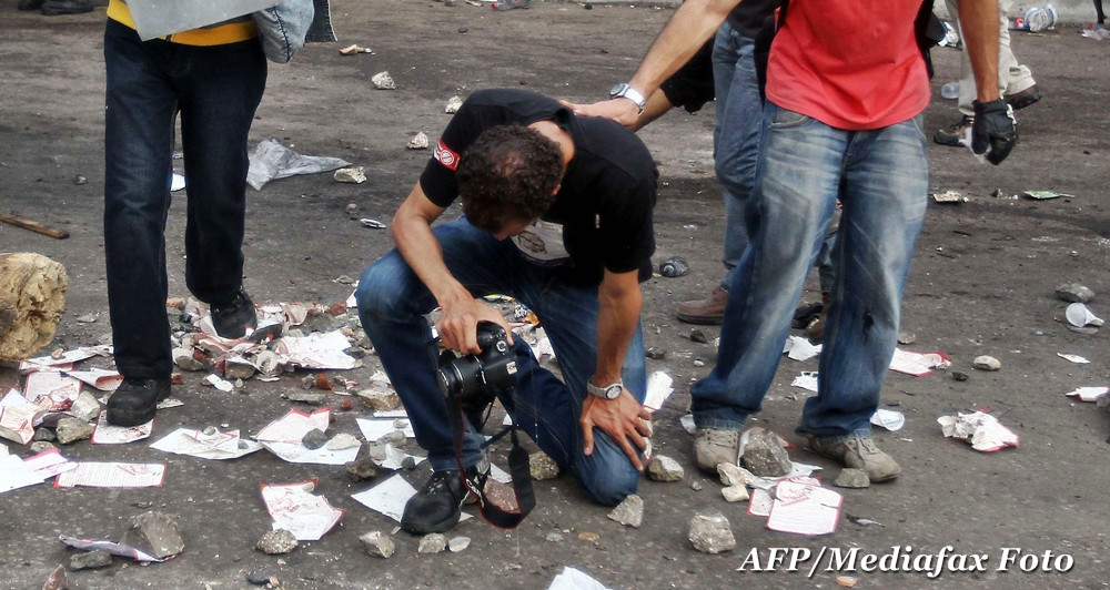 Razboiul de la Euro 2012. Fotoreporter roman, internat dupa ce a fost atacat si talharit in Ucraina